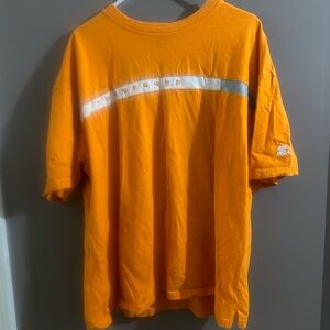 Vintage starter brand University of Tennessee shirt. Thicker material with slits